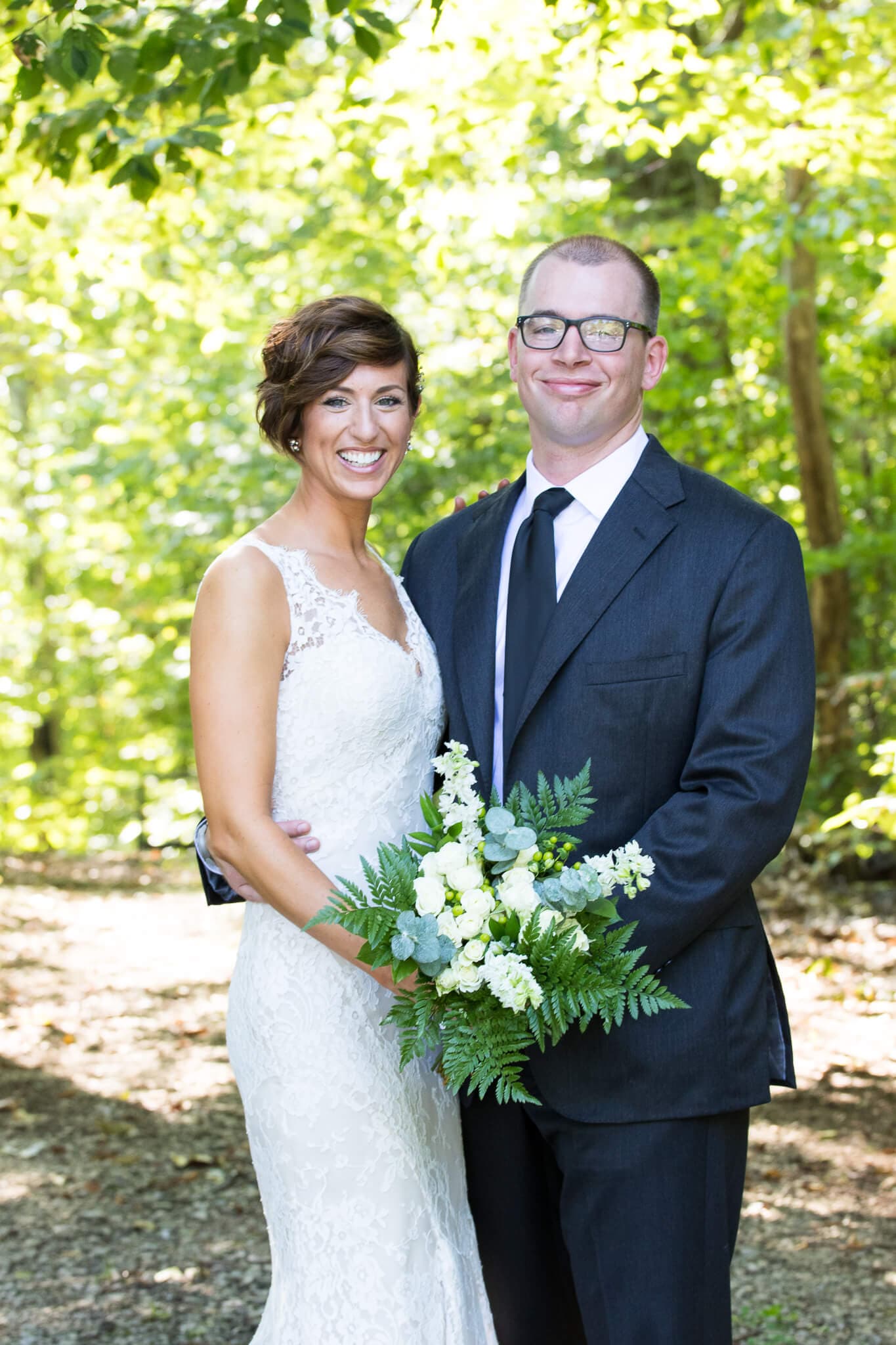 Groom and bride with a scenic backdrop